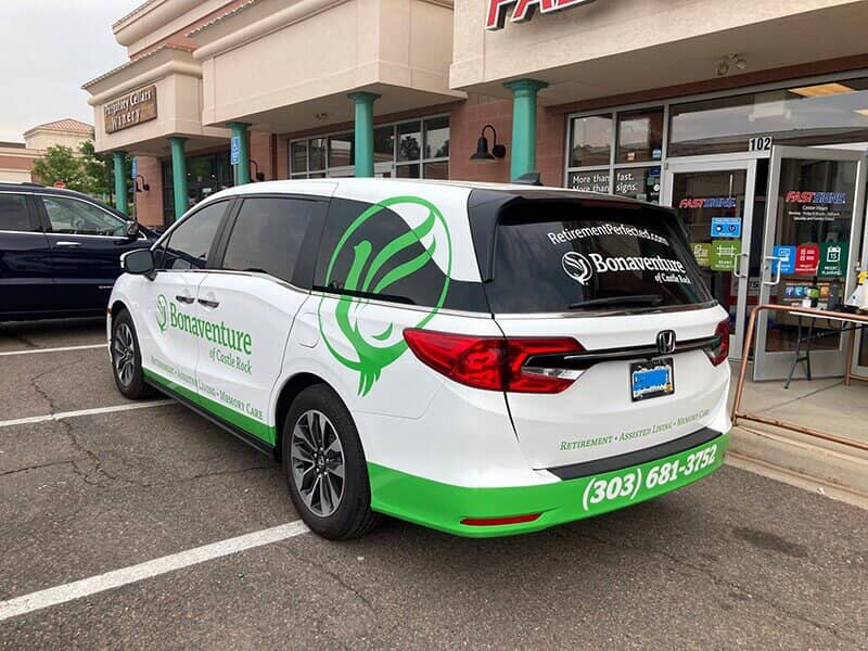 Bonaventure Vehicle  parked outside the fast sign building